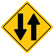 Yellow up and down sign