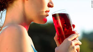 Woman Drinking Cranberry Juice