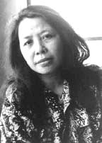 Lê Minh Khuê (1949), real name Vũ Thị Miền, is a fiction writer and editor. 1996 Photo by Tim Karr. She was born in Thanh Hoá to a family much affected by ... - Le_Minh_Khue