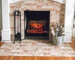 Image of Living room with 3D brick wallpaper fireplace surround