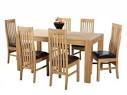 Solid oak extending dining table and 