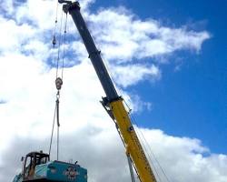 Image of Crane Lifting Heavy Equipment