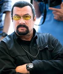 U.S. actor Steven Seagal looks on as he waits for a news conference for the U.S. Congressional delegation to Russia in the U.S. Embassy in Moscow, Russia, ... - 1370273387_steven-seagal-467
