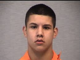 The school&#39;s resource officer arrested Carlos Rodriguez, 17, shortly after 9 a.m. after school officials found a loaded pistol in his backpack. - rodriguez-carlos