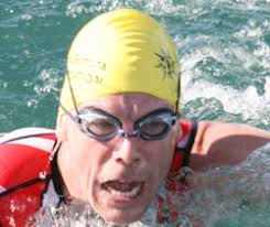 In the Bank of Bermuda Individual Triathlon, Evan Naude came from behind to ... - swim71007