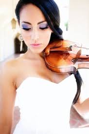 “Esther Anaya is an explosive entertainer, bringing beauty and music to life with her amazing talent as a violinist. Born in Monteria, Colombia, ... - 8627936