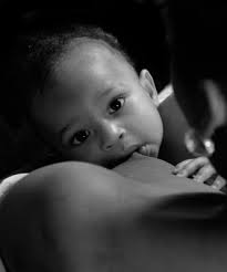 Image result for african mother breastfeeding