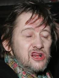 Shane McGowan This is what Shane looks like without his falsies in… fucking hideous. - shanemac-teeth