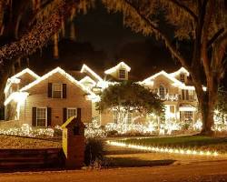 Image of house decorated with Christmas lights by Amco