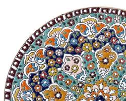 Image of traditional Iranian ceramic plate with Minakari handpainted designs