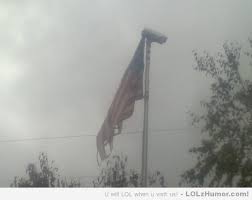 Tattered American flag, with a security camera on it. Symbol of ... via Relatably.com