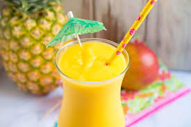 Frozen Pineapple Mango Vodka Slush | Champagne and Coconuts