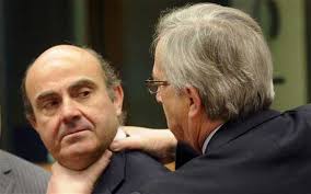 Jean Claude Juncker, head of the group of 17 euro zone finance ministers, was snapped strangling his Spanish counterpart. Photo: AP - juncker-spain_2166190b