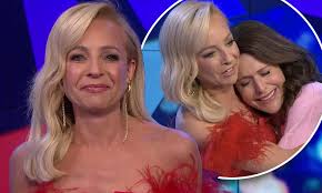 Emotional Carrie Bickmore breaks down in tears as she hosts her final 
episode of The Project