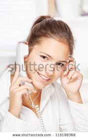 Portrait of office girl on land line call, smiling at camera - stock photo portrait of office girl on land . - stock-photo-portrait-of-office-girl-on-land-line-call-smiling-at-camera-115198366