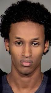 Yelling &#39;Allahu Akbar!&#39; – Arabic for &#39;God is great!&#39; – Mohamed Osman Mohamud tried to kick agents and police as ... - article-1333576-0C40F3C3000005DC-410_233x423