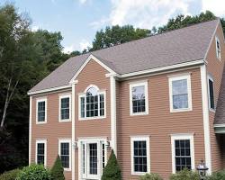 Top 10 Brick House Paint Colors for 2024: Mocha exterior house paint color