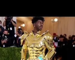 Lil Nas X in a gold-plated suit of armor