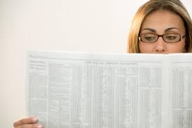 Image result for pictures of person reading newspapers