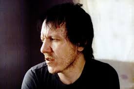 The people who knew him in those years open up about the demons that he battled to the end. Elliott Smith in 2003, seven months before his death. - 131021-elliott-smith-ten-years