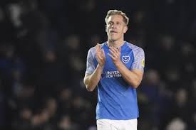 Michael Morrison adds to uncertainty surrounding his Portsmouth future amid 
reports of Cambridge United return