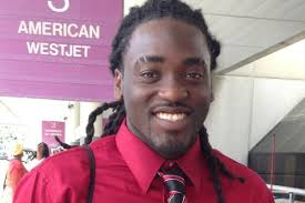 Running back Alex Collins sported a red shirt and a Razorback tie on his way to - Alex_Collins_Tie__r600x400