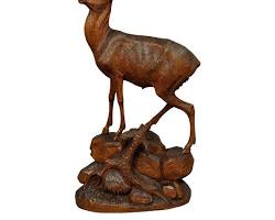 Wood deer statue
