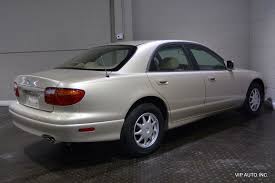 Image result for Elegant Beige 1996 Mazda