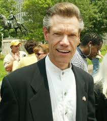 Randy Travis suffered stroke and underwent a surgery to relieve pressure on his brain on Wednesday evening, July 10, his publicist Kirt Webster said. - randy-travis-america-stands-behind-israel-rally-03