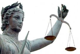 statue of Lady Justice without her blindfold