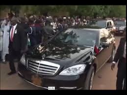 Image result for Woman on wheelchair blocked Buhari's convoy