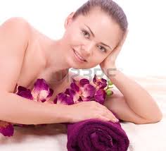 Beauty spa woman with towel and pink orchid on background Stock Photo - 14758196. Beauty spa woman with towel and pink orchid on background - 14758196-beauty-spa-woman-with-towel-and-pink-orchid-on-background