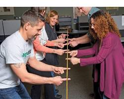 Image of person playing the Helium Stick Challenge game