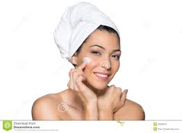 Image result for photos of a woman applying moisturizer