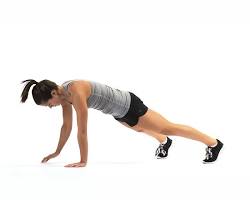 Image of someone doing plank with shoulder taps