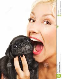 Cute blonde playing with a pug puppy. MR: YES; PR: NO - cute-blonde-pug-puppy-27350855