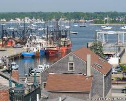 Image of New Bedford waterfront with historic ships docked