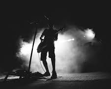 Image of Silhouette of a guitarist wallpaper