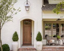 Top 10 Brick House Paint Colors for 2024: Oyster White exterior house paint color
