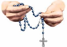 Resultado de imagen para manos rezando con rosario