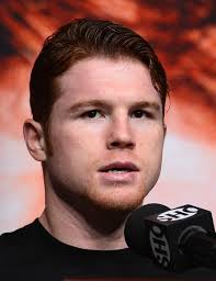 Boxer Canelo Alvarez speaks during the final news conference for his fight with Floyd Mayweather Jr. at the MGM Grand Hotel/Casino on ... - Canelo%2BAlvarez%2BFloyd%2BMayweather%2BJr%2Bv%2BCanelo%2BXFzE11D__NUl