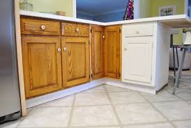 Image result for baseboards painted same color as cabinets