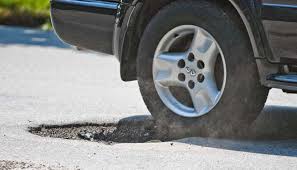 Image result for Potholes picture